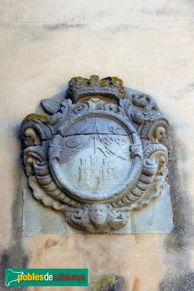 Sant Feliu de Guíxols - Monestir, escut a un mur