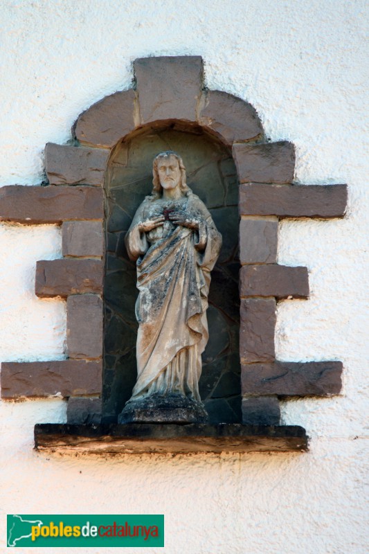 Sant Quirze Safaja - Mas Badó, detall façana