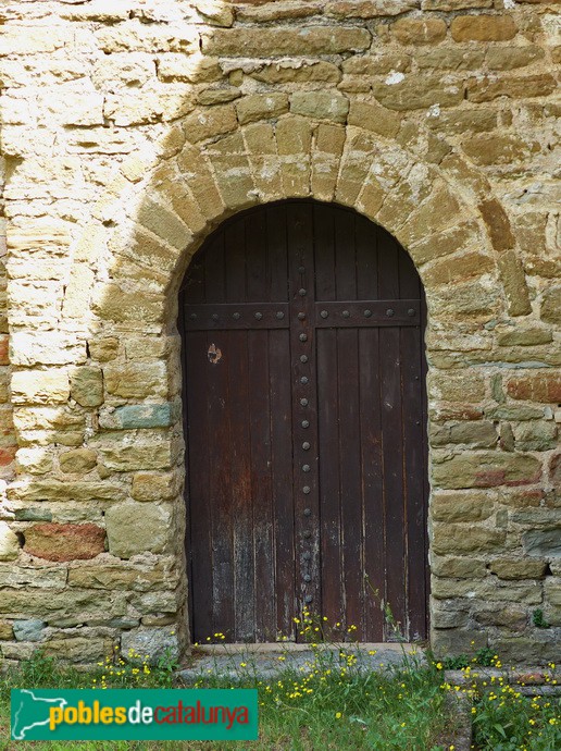 Porta lateral, façana sud