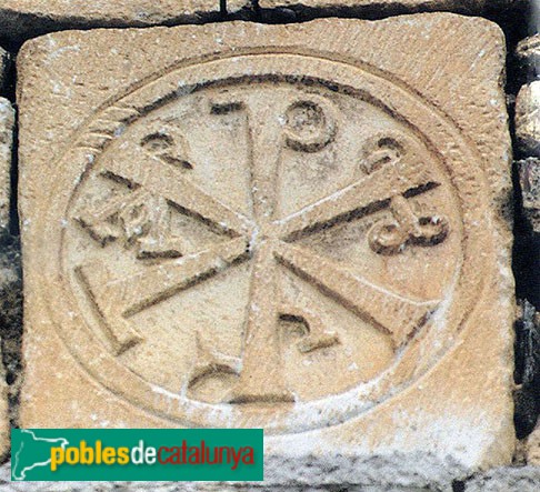 Salardú - Sant Andreu, crismó damunt la portalada