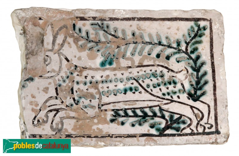 Museu de l'Enrajolada - Rajola de ceràmica verd i manganès.Rajola rectangular amb motiu del conill. Segle XIV