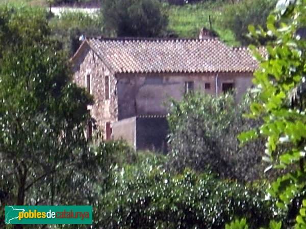 Can Castellet, fotografiada des de la riera de Sentmenat