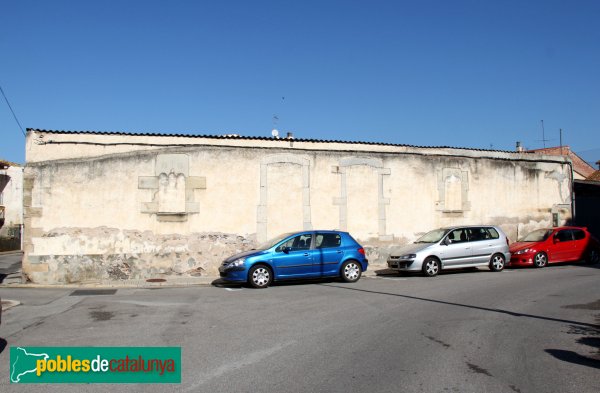 Riudarenes - Mur de la plaça del Diumenge