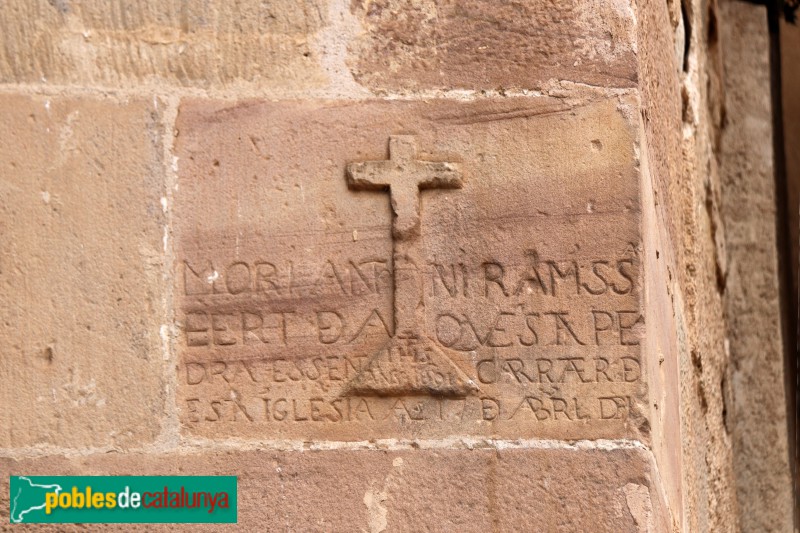 La Garriga - Església de Sant Esteve. Làpida al·lusiva a la mort d'un obrer, l'any 1691