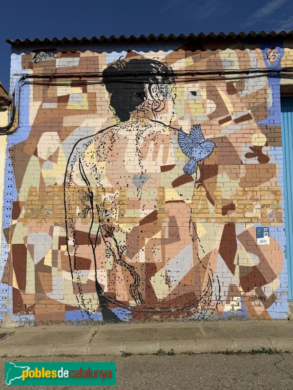 Torrefarrera - Mural <i>Arrels i ales</i> (Llukutter, 2020) (Foto: Albert Esteves, 2025) Torrefarrera - Mural <i>Arrels i ales</i> (Llukutter, 2020)