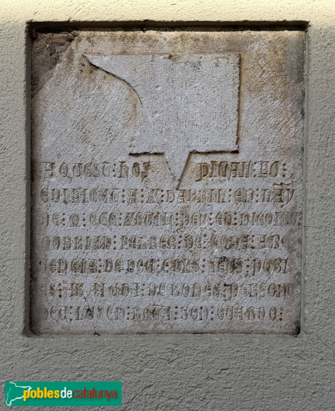 Medinyà - Antic Camí Ral. Inscripció d el'antic hospital de Sant Jaume