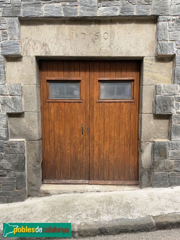L'Esquirol - Carrer Major. Llinda de 1760