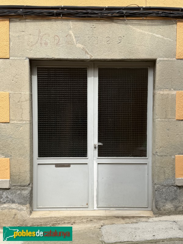 L'Esquirol - Carrer Major. Llinda de 1729