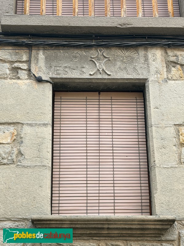 L'Esquirol - Carrer Major. Llinda de 1788