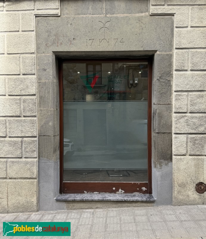L'Esquirol - Carrer Major. Llinda . Llinda de 1774
