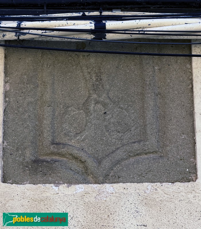 Sant Julià de Vilatorta - Carrer de la Mercè. Llinda amb tisores