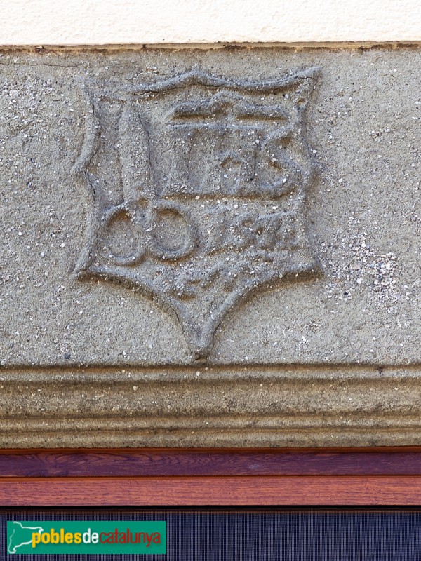 Sant Julià de Vilatorta - Carrer de la Mercè. Llinda de Cal Martinet (1571)