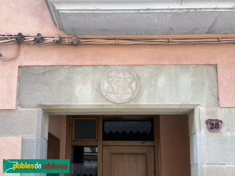 Sant Julià de Vilatorta - Llinda de Can Tametus, amb estrella de sis puntes