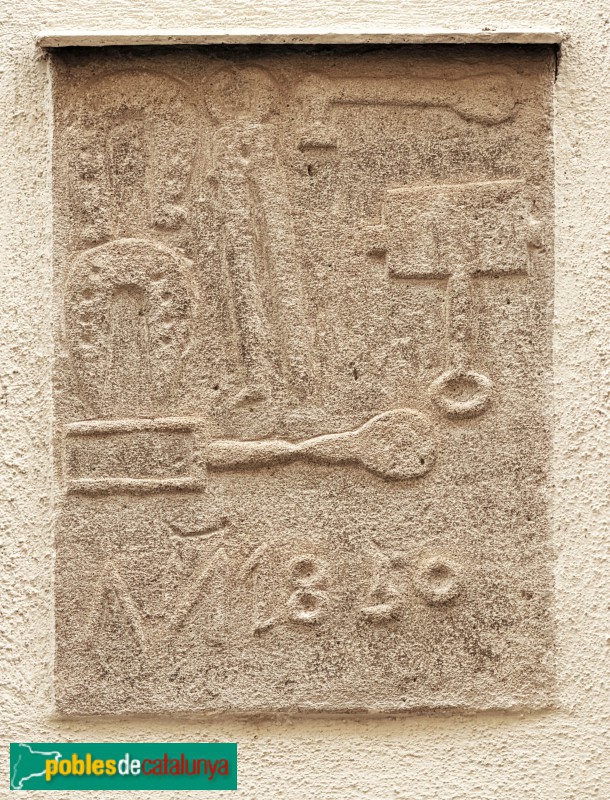 El Masroig - Carrer Major. Relleu de Ca la Pubilla