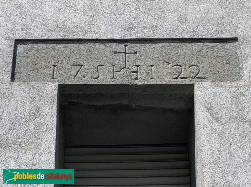 Sant Pere de Torelló - Portal de 1722 (Foto: Albert Esteves, 2026) Sant Pere de Torelló - Portal de 1722